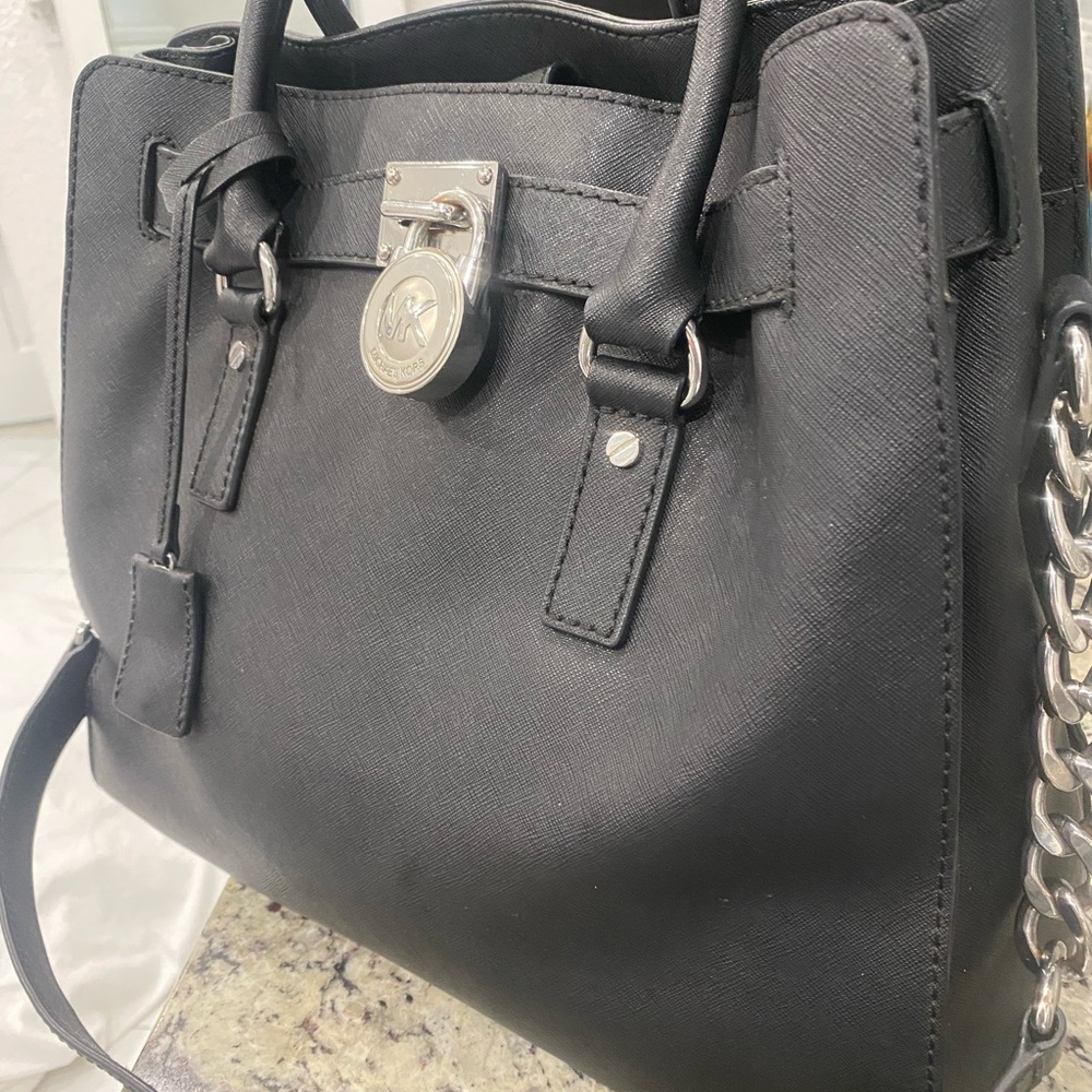 Micheal Kors purses and wallets $100.00 per purse and $50.00 for wallets